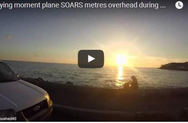 بالفيديو: طائرة تكاد تصدم مصوراً على بعد سنتيمترات قليلة