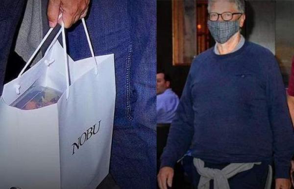رابع أغنى شخص في العالم (بيل غيتس) يحمل بقايا طعام عشائه الى منزله