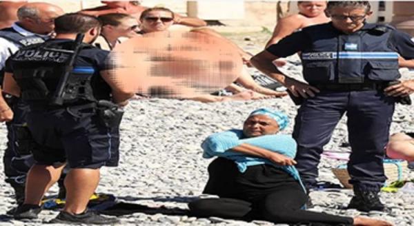 الشرطة الفرنسية تغرم مسلمة وتجبرها على خلع ملابسها بشاطئ نيس