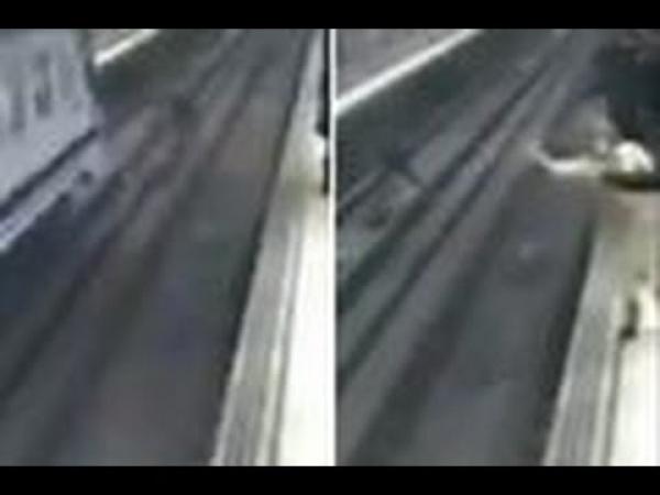بالفيديو: لحظة إنقاذ شرطي لرجل سقط على سكة المترو