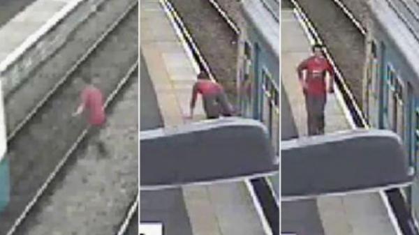 بالفيديو: طالب يقفز أمام قطار ويجبره على التوقف