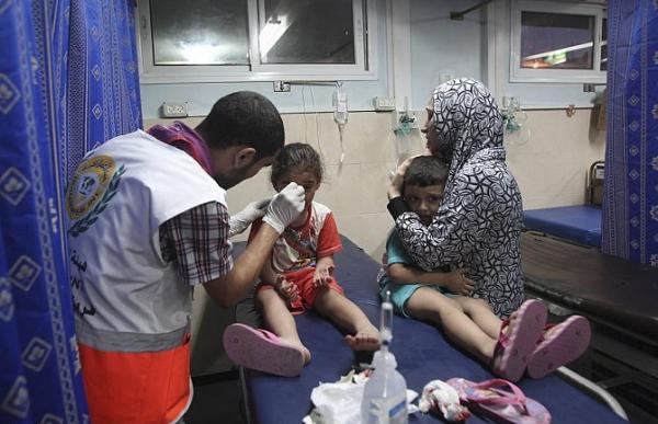 18 جريحا أغلبهم أطفال في غارة إسرائيلية على برج سكني بغزة
