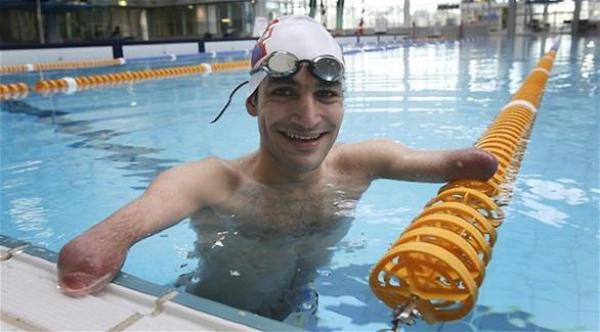عراقي ولد بلا ذراعين وساقين يشارك في أولمبياد ريو