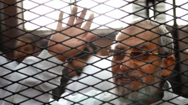الحكم بالسجن المؤبد على المرشد العام لجماعة "الإخوان المسلمين" في قضية أحداث "البحر الأعظم" بالجيزة