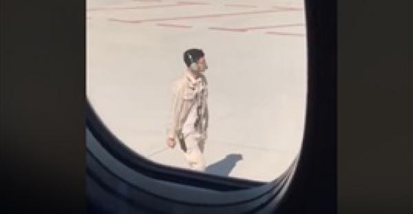 خصم 10 % من راتب موظف بالمطار بسبب وسامته (فيديو)