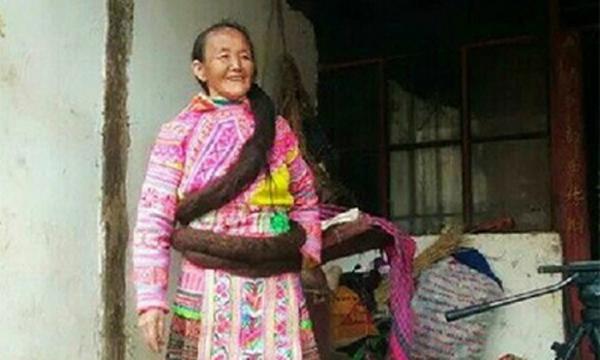 بالصور .. امرأة صينية تسعى لدخول «جينس» لكونها صاحبة أطول شعر في العالم